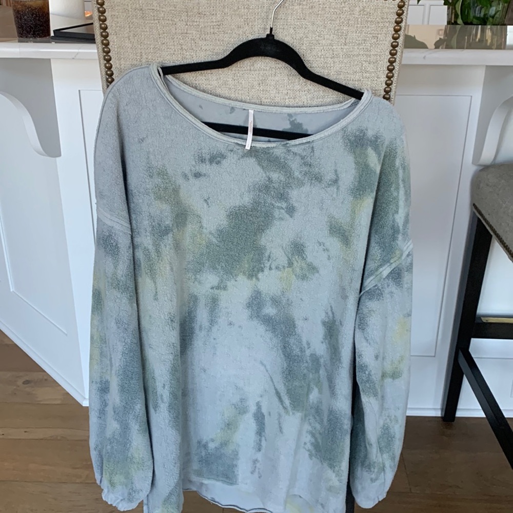Free People sweatshirt.
